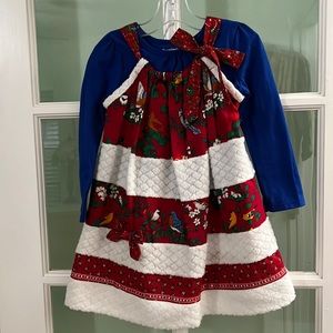New handmade girls’ six tiered Christmas dress in a size 3/4.